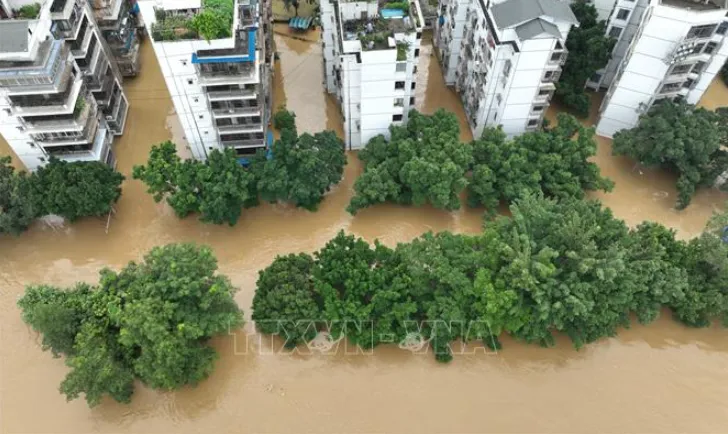 Trung Quốc ứng phó mưa lũ diện rộng- Ảnh 1. Trung Quốc ứng phó mưa lũ diện rộng- Ảnh 1.