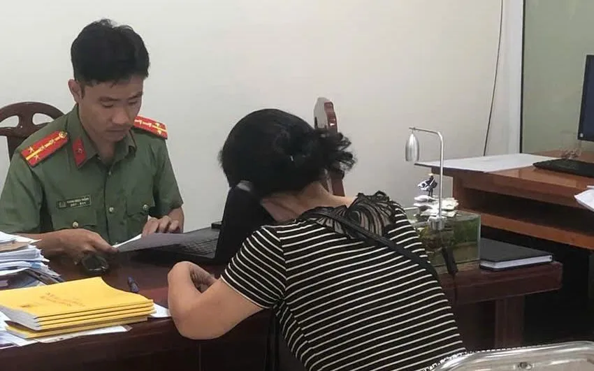 Bà N.T.H tại cơ quan Công an. 