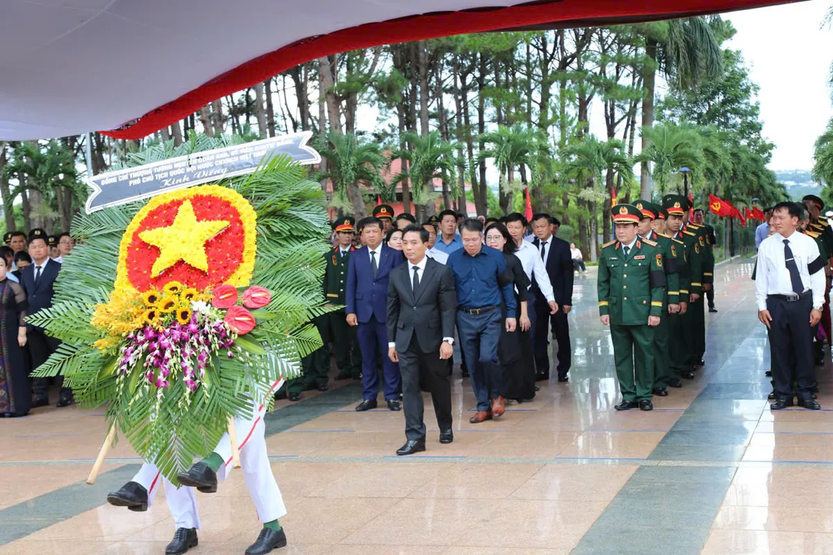 Đắk Lắk truy điệu, an táng 27 hài cốt liệt sĩ quân tình nguyện hy sinh tại Campuchia - Ảnh 1.
