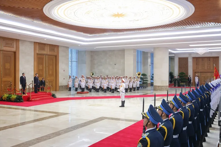 Thủ tướng Lê Minh Hưng chủ trì lễ đón chính thức Thủ tướng Lào Sonexay Siphandone  - Ảnh 3.
