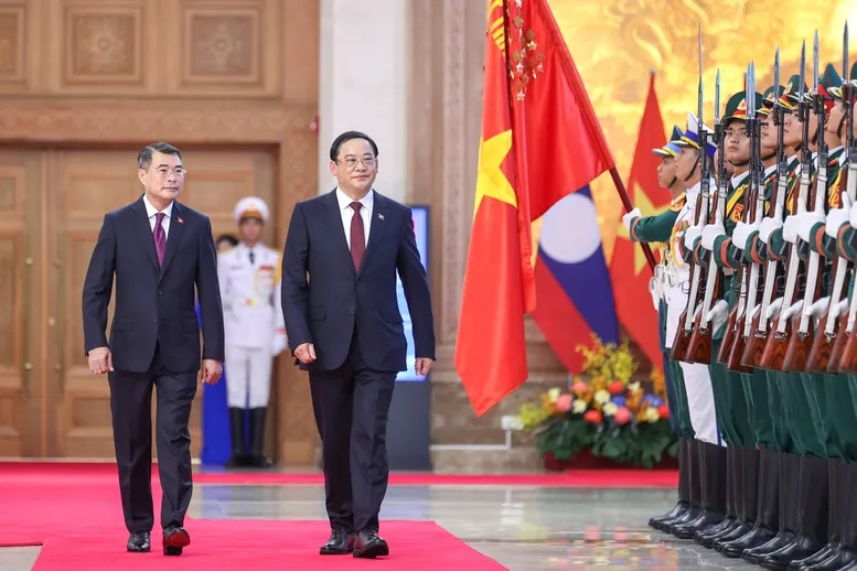 Thủ tướng L&ecirc; Minh Hưng chủ tr&igrave; lễ đ&oacute;n ch&iacute;nh thức Thủ tướng L&agrave;o Sonexay Siphandone  - Ảnh 1.