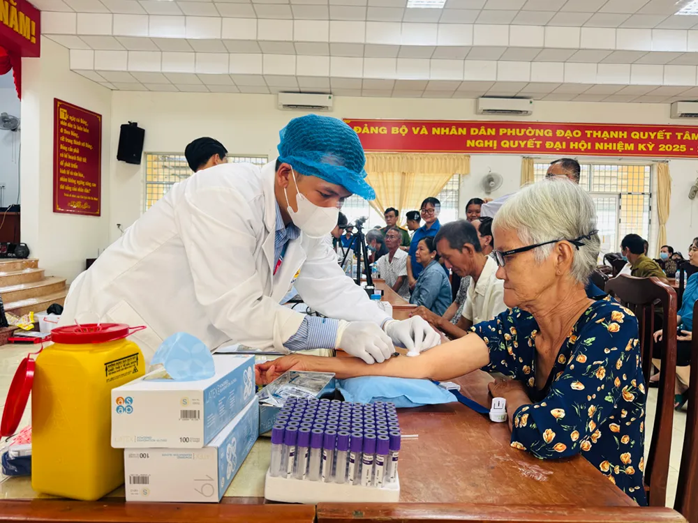 Đồng Tháp thu nhận mẫu ADN thân nhân liệt sĩ - Ảnh 1.