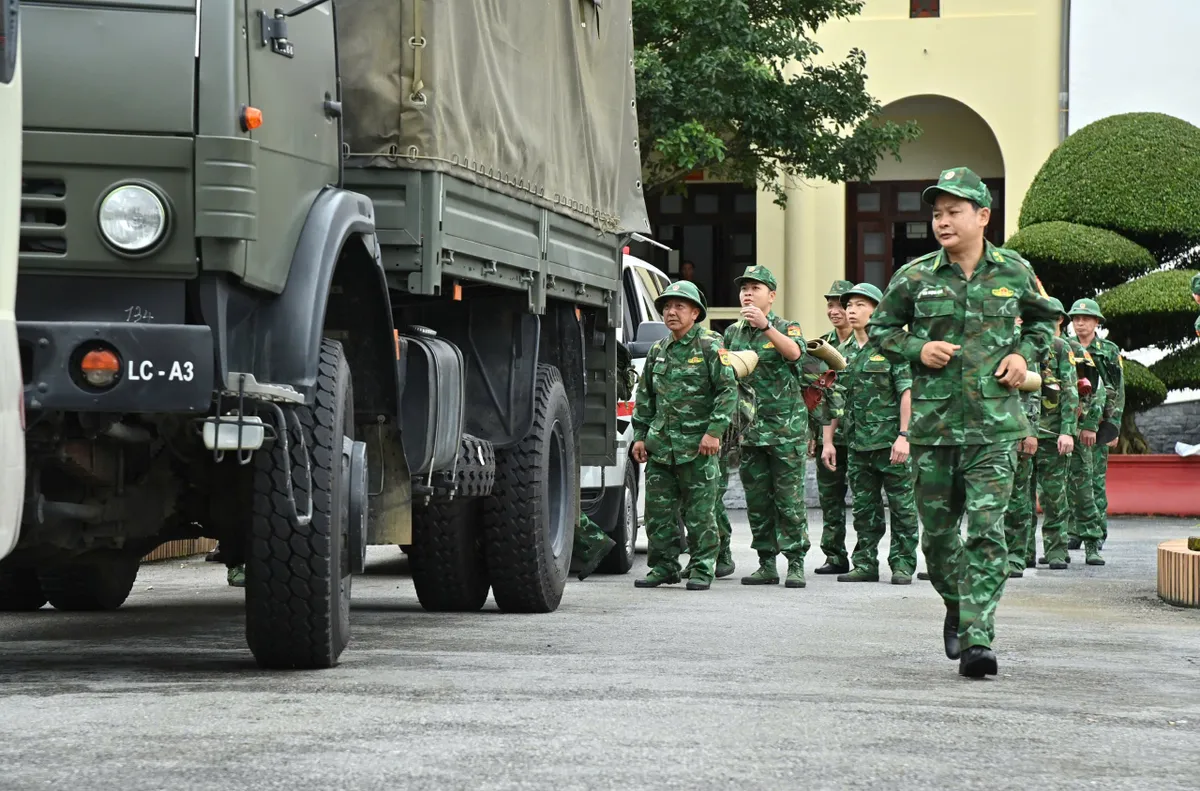 BĐBP Lai Châu điều động lực lượng hỗ trợ khắc phục hậu quả mưa lũ- Ảnh 1.