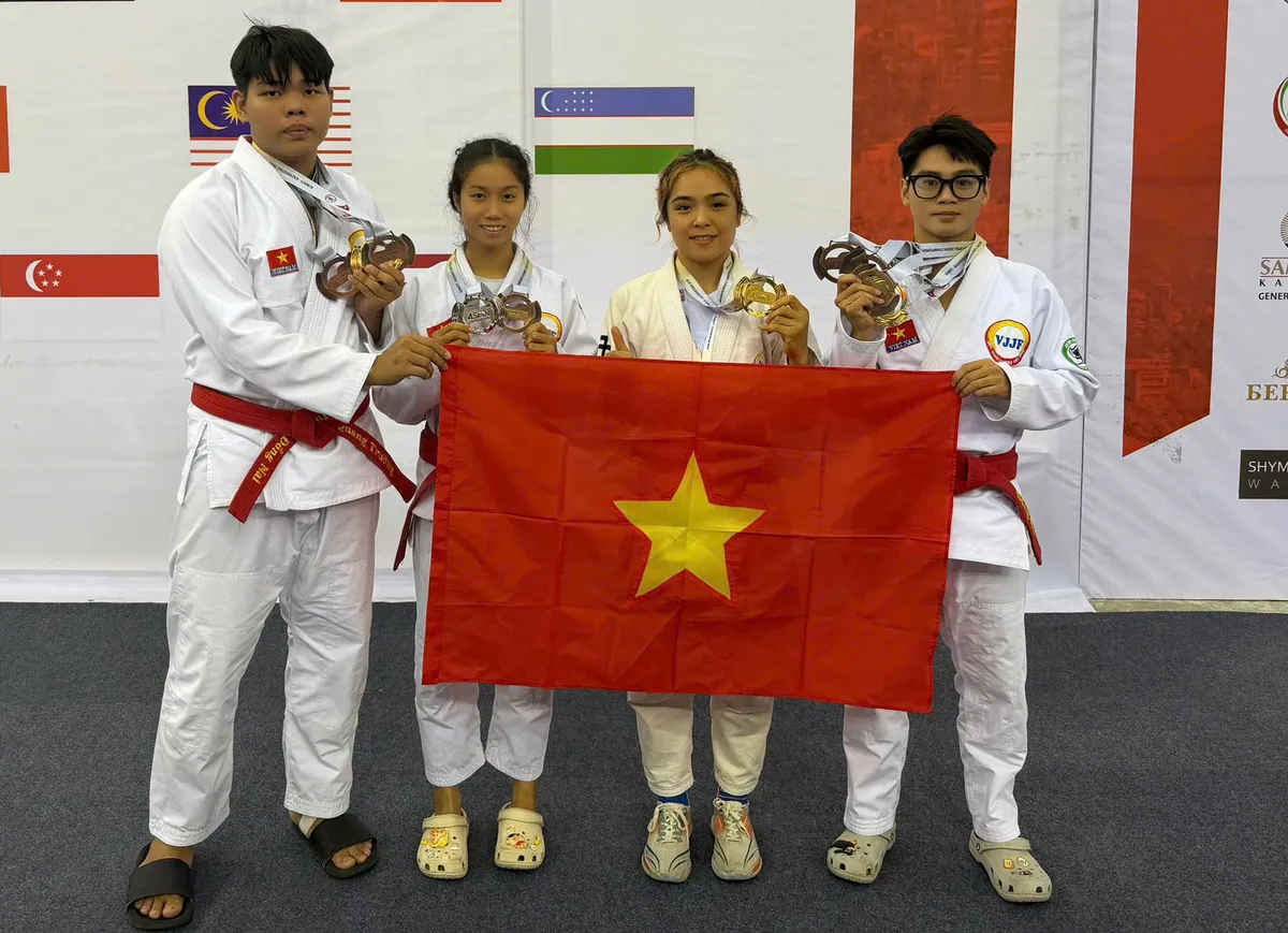 Nhà vô địch Châu Á Lò Thị Phung hướng về vùng lũ quê hương Lai Châu- Ảnh 1.