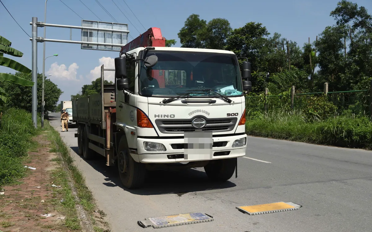 Hà Nội: Tăng cường kiểm tra nồng độ cồn, ma túy tài xế xe tải, xe container trên Đại lộ Thăng Long - Ảnh 2.
