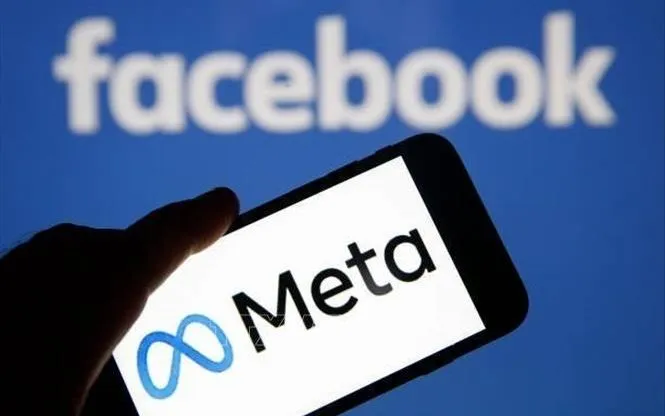 Biểu tượng Meta và Facebook trên màn hình điện thoại thông minh - Ảnh: Getty Images/TTXVN