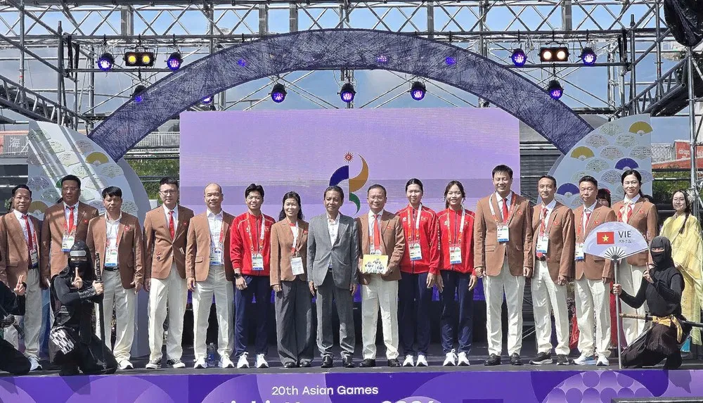 Quốc kỳ Việt Nam tung bay tại ASIAD 20- Ảnh 2.