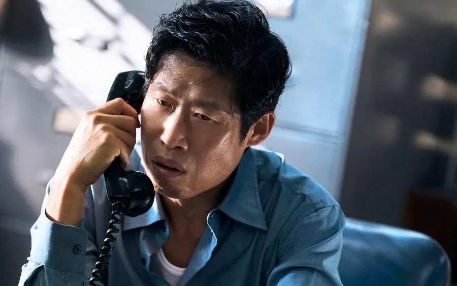 Yoo Hae-jin trong một cảnh phim "The Assassin(s)". (Ảnh: Soompi)