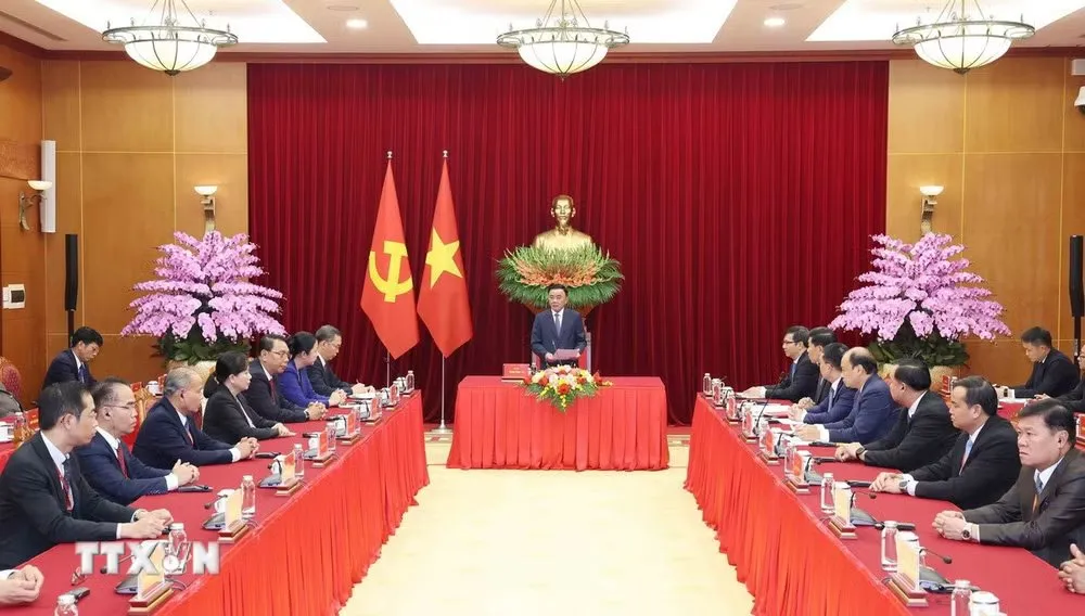 Thường trực Ban B&iacute; thư Trần Cẩm T&uacute; tiếp Đo&agrave;n c&aacute;n bộ cao cấp Đảng Nh&acirc;n d&acirc;n C&aacute;ch mạng L&agrave;o - Ảnh 1.