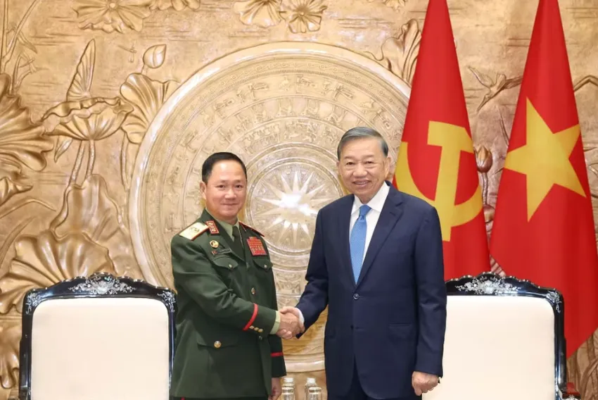 Tổng B&iacute; thư, Chủ tịch nước T&ocirc; L&acirc;m tiếp Bộ trưởng Quốc ph&ograve;ng L&agrave;o - Ảnh 1.