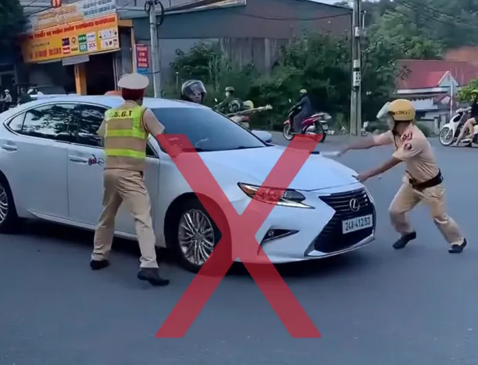 Khởi tố nữ tài xế ô tô tăng ga bỏ chạy khi đang làm việc với CSGT - Ảnh 2.