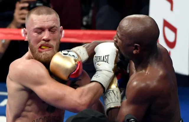 Thua Mayweather, McGregor bị cấm thi đấu 2 tháng - Ảnh 1.