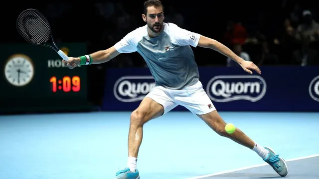 ATP Finals: Djokovic thắng dễ Zverev, Cilic đánh bại Isner - Ảnh 2.