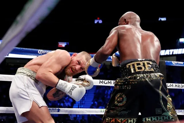 Floyd Mayweather trở lại sàn đấu - Ảnh 2.