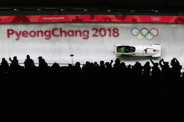 Những hình ảnh ấn tượng trong ngày thi đấu thứ 11 của Olympic PyeongChang 2018 - Ảnh 5.