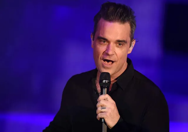 Robbie Williams sẽ khuấy động lễ khai mạc World Cup 2018 - Ảnh 1.