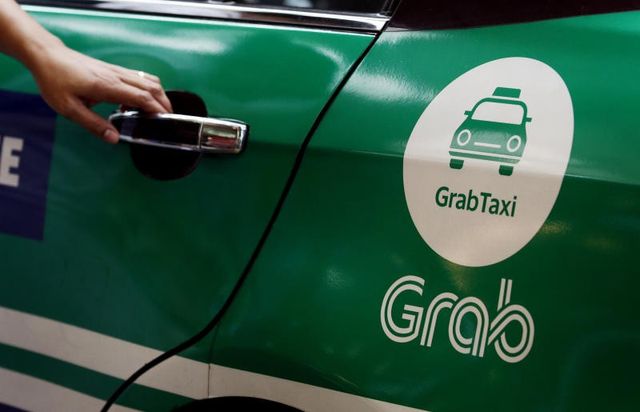 Bị quản như taxi, Grab đề xuất không gắn hộp đèn trên nóc xe - Ảnh 1.