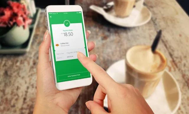 GrabPay by Moca cho phép người dùng thanh toán tại cửa hàng và nạp tiền di động - Ảnh 2.