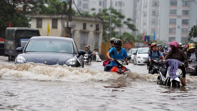 Nam Bộ mưa nhiều đến cuối tuần, đề phòng ngập úng - Ảnh 1.