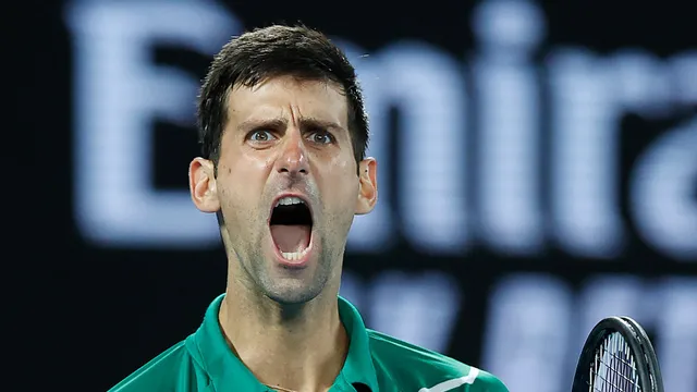 Australia mở rộng 2020: Novak Djokovic lên ngôi lần thứ 8 sau 5 set kịch tính - Ảnh 4. Australia mở rộng 2020: Novak Djokovic lên ngôi lần thứ 8 sau 5 set kịch tính - Ảnh 4.