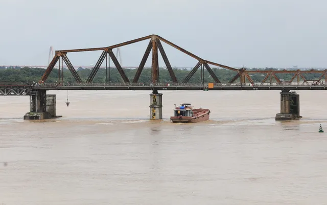 Mực nước sông Hồng lên nhanh, nguy cơ ngập lụt vùng trũng và bãi bồi - Ảnh 6.