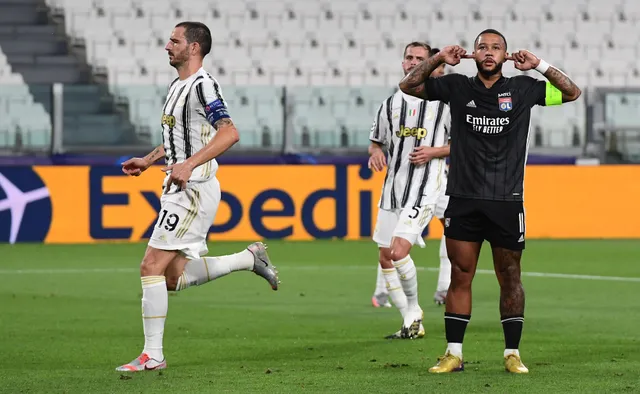 Ronaldo lập cú đúp, Juventus vẫn bị loại khỏi Champions League - Ảnh 1.