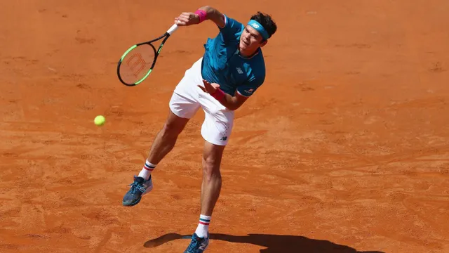 Vòng 2 giải quần vợt Italia mở rộng: Milos Raonic, Fognini đều bị loại - Ảnh 2.