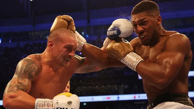 Anthony Joshua kích hoạt điều khoản tái đấu với Oleksandr Usyk - Ảnh 1.