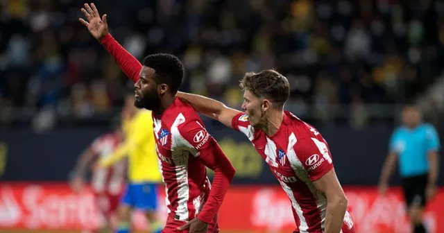 Thắng thuyết phục Cadiz, Atletico Madrid bám sát Real Madrid - Ảnh 1.