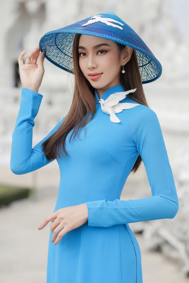 Thùy Tiên diện áo dài sau đăng quang Miss Grand International 2021 - Ảnh 2.