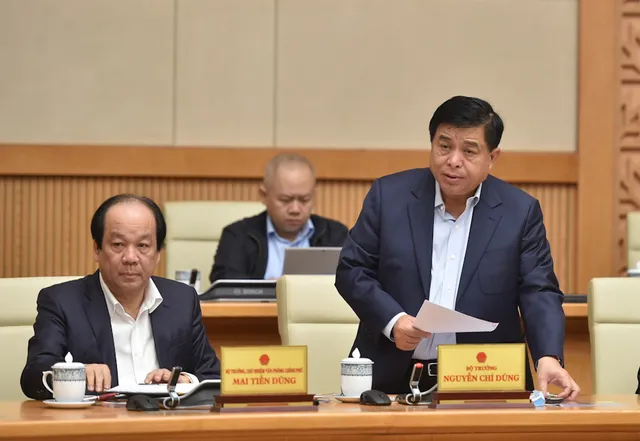COVID-19 bùng phát, kịch bản nào cho kinh tế Việt Nam? - Ảnh 1. COVID-19 bùng phát, kịch bản nào cho kinh tế Việt Nam? - Ảnh 1.