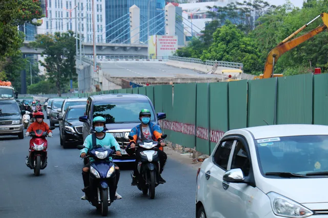 Công nhân đội nắng, tăng tốc hoàn thành đại công trường đường Nguyễn Hữu Cảnh - Ảnh 6. Công nhân đội nắng, tăng tốc hoàn thành đại công trường đường Nguyễn Hữu Cảnh - Ảnh 6.
