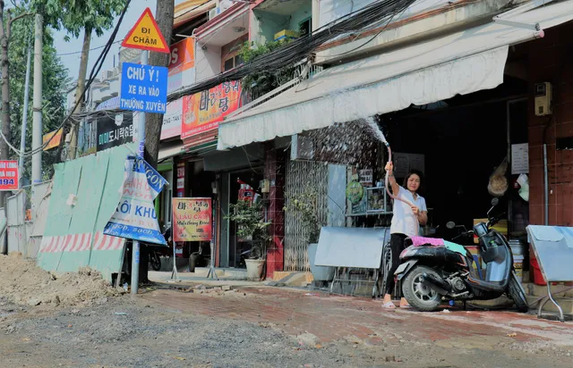Công nhân đội nắng, tăng tốc hoàn thành đại công trường đường Nguyễn Hữu Cảnh - Ảnh 7. Công nhân đội nắng, tăng tốc hoàn thành đại công trường đường Nguyễn Hữu Cảnh - Ảnh 7.