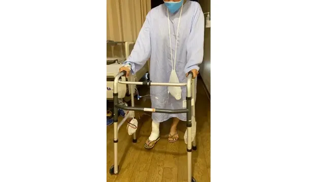 The patient is walking just 24 hours after the surgery.