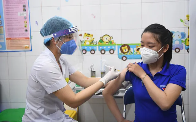 Ảnh: Những mũi tiêm vaccine COVID-19 đầu tiên tại Việt Nam - Ảnh 6.