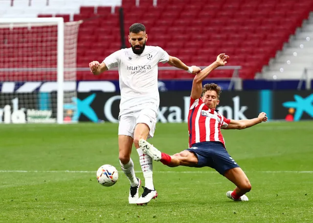 Atletico đòi lại ngôi đầu từ tay Real Madrid - Ảnh 1.