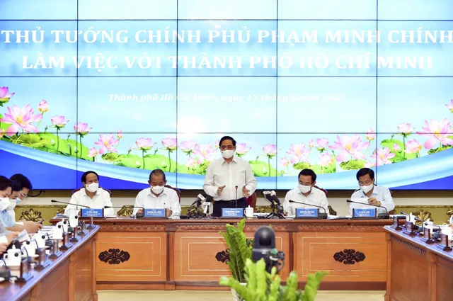 Thủ tướng Phạm Minh Chính làm việc với TP Hồ Chí Minh để giải quyết những vấn đề cấp bách - Ảnh 1.