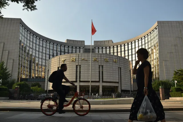 Trung Quốc hạ lãi suất cho vay ngắn hạn - Ảnh 1.