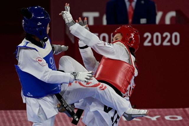 Kim Tuyền thắng đậm, tiến vào tứ kết Taekwondo Olympic Tokyo 2020 - Ảnh 2.