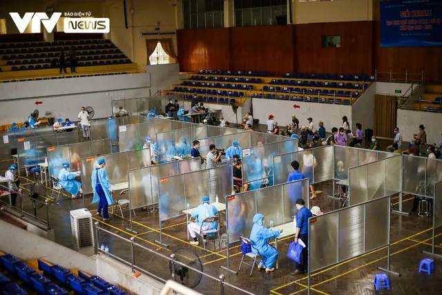 Sự chuyên nghiệp và ngăn nắp bên trong cơ sở tiêm vaccine COVID-19 tại Hà Nội - Ảnh 1. Sự chuyên nghiệp và ngăn nắp bên trong cơ sở tiêm vaccine COVID-19 tại Hà Nội - Ảnh 1.