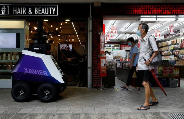 Singapore sử dụng robot để giám sát tuân thủ phòng dịch - Ảnh 1. Singapore sử dụng robot để giám sát tuân thủ phòng dịch - Ảnh 1.