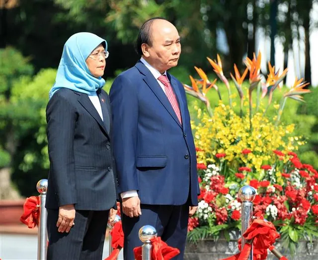 Chủ tịch nước và Phu nhân chủ trì tiệc chiêu đãi chào mừng Tổng thống Singapore và Phu quân - Ảnh 2.