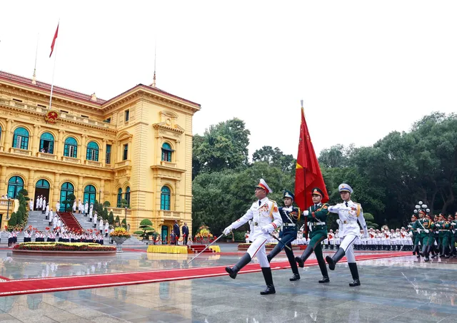 Chủ tịch nước Nguyễn Xuân Phúc chủ trì Lễ đón Tổng thống Uganda thăm chính thức Việt Nam - Ảnh 4.