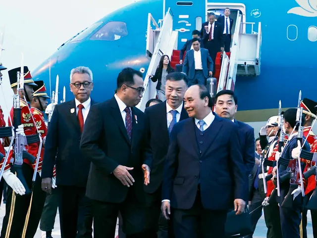 Chủ tịch nước Nguyễn Xuân Phúc bắt đầu chuyến thăm cấp Nhà nước đến Indonesia - Ảnh 1.