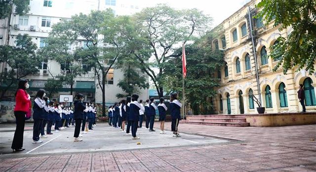 Đảm bảo an toàn phòng dịch cho học sinh khi trở lại trường - Ảnh 1.