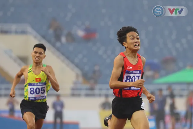 Lương Đức Phước giành HCV điền kinh nội dung 1.500m SEA Games 31 - Ảnh 1.