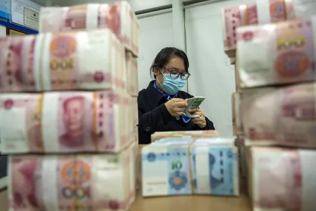 Goldman Sachs hạ dự báo tăng trưởng kinh tế Trung Quốc - Ảnh 1. Goldman Sachs hạ dự báo tăng trưởng kinh tế Trung Quốc - Ảnh 1.