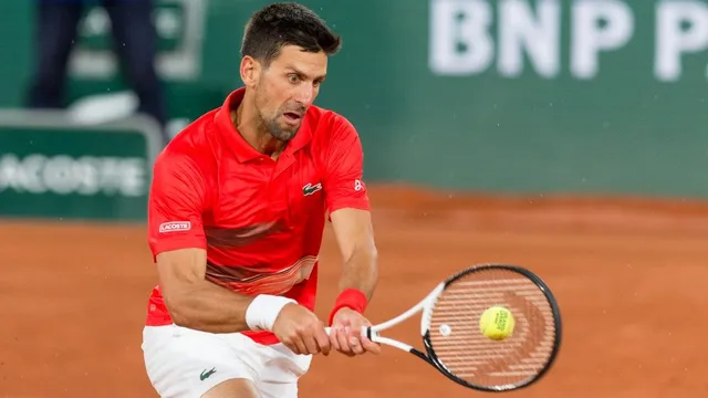 Djokovic và Nadal dễ dàng vượt qua vòng 2 Pháp mở rộng - Ảnh 1.