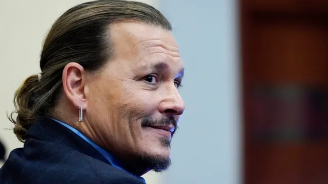 Johnny Depp bị vợ cũ nhổ nước bọt, ném lon Red Bull vào người - Ảnh 1.