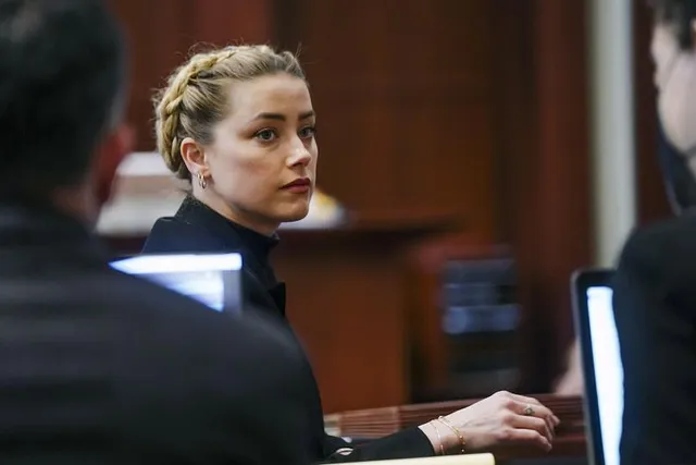 Danh tiếng của Amber Heard sẽ mãi gắn liền với lùm xùm kiện tụng - Ảnh 2. Danh tiếng của Amber Heard sẽ mãi gắn liền với lùm xùm kiện tụng - Ảnh 2.